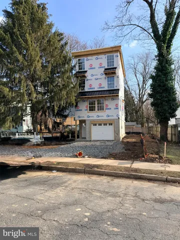 a front view of house with a yard