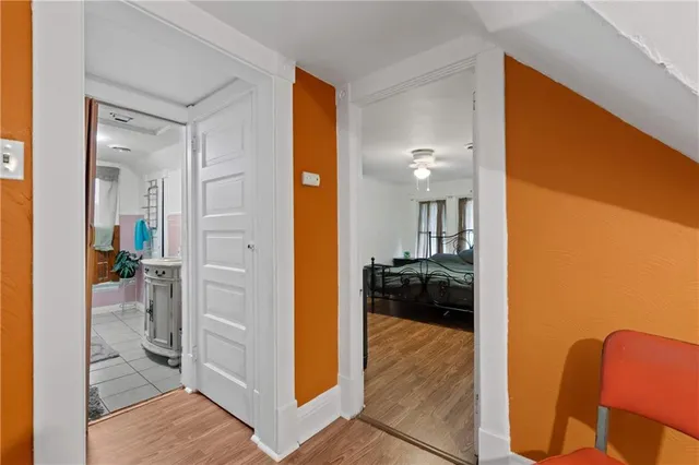 a kitchen with a refrigerator and a sink