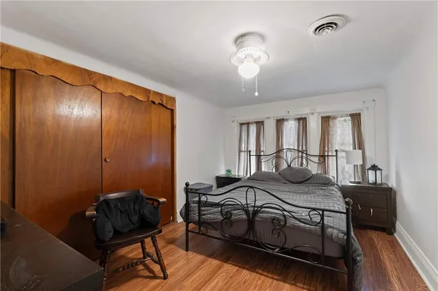 a view of a livingroom with furniture and windows