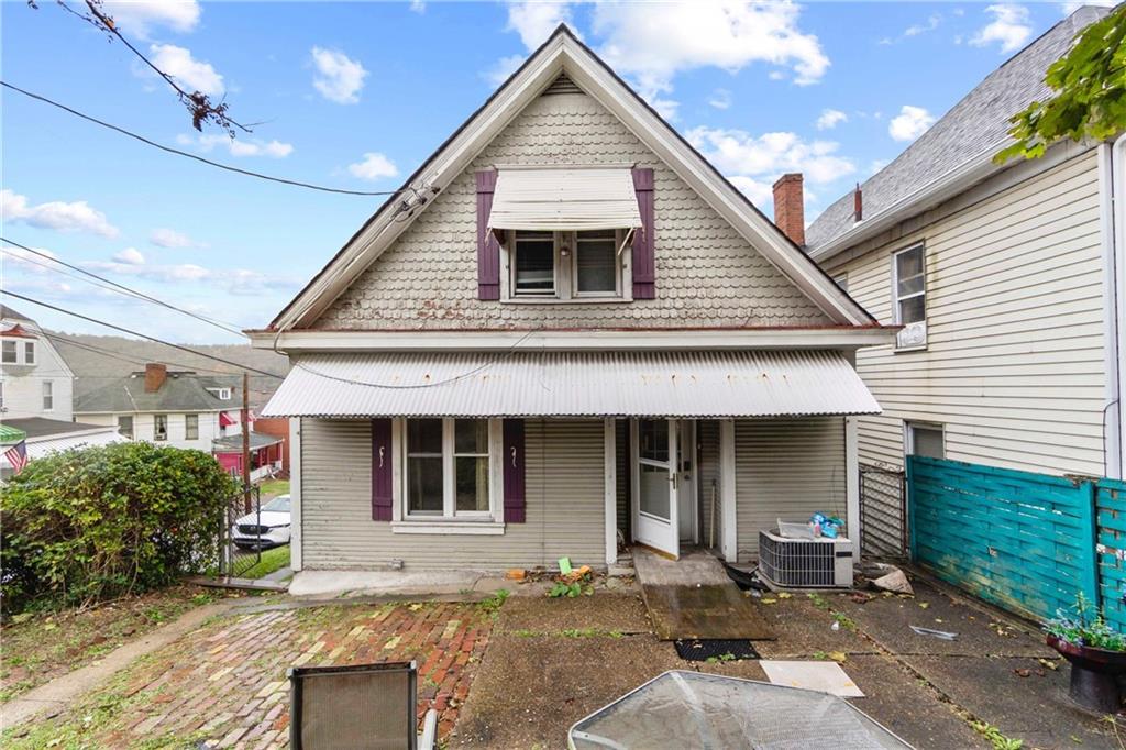 999 Thompson Avenue Donora, PA 15033 - Photo 23 of 24 a front view of a house with garden