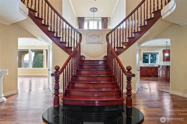 a view of a balcony with chairs