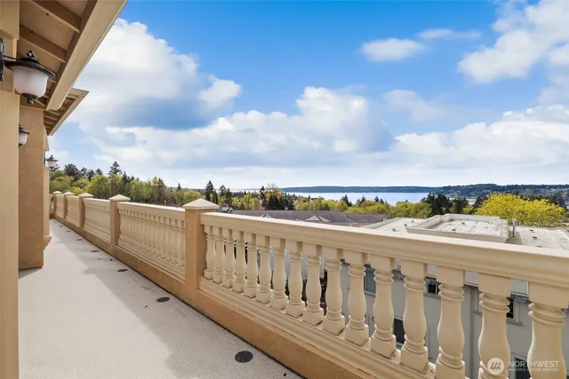 a aerial view of a house with a garden and trees