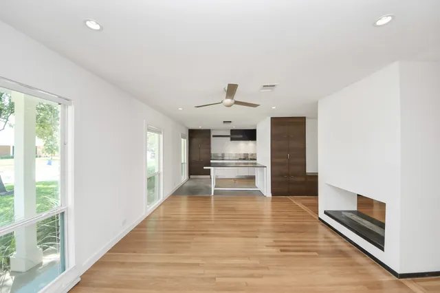 a view of kitchen with sink and window