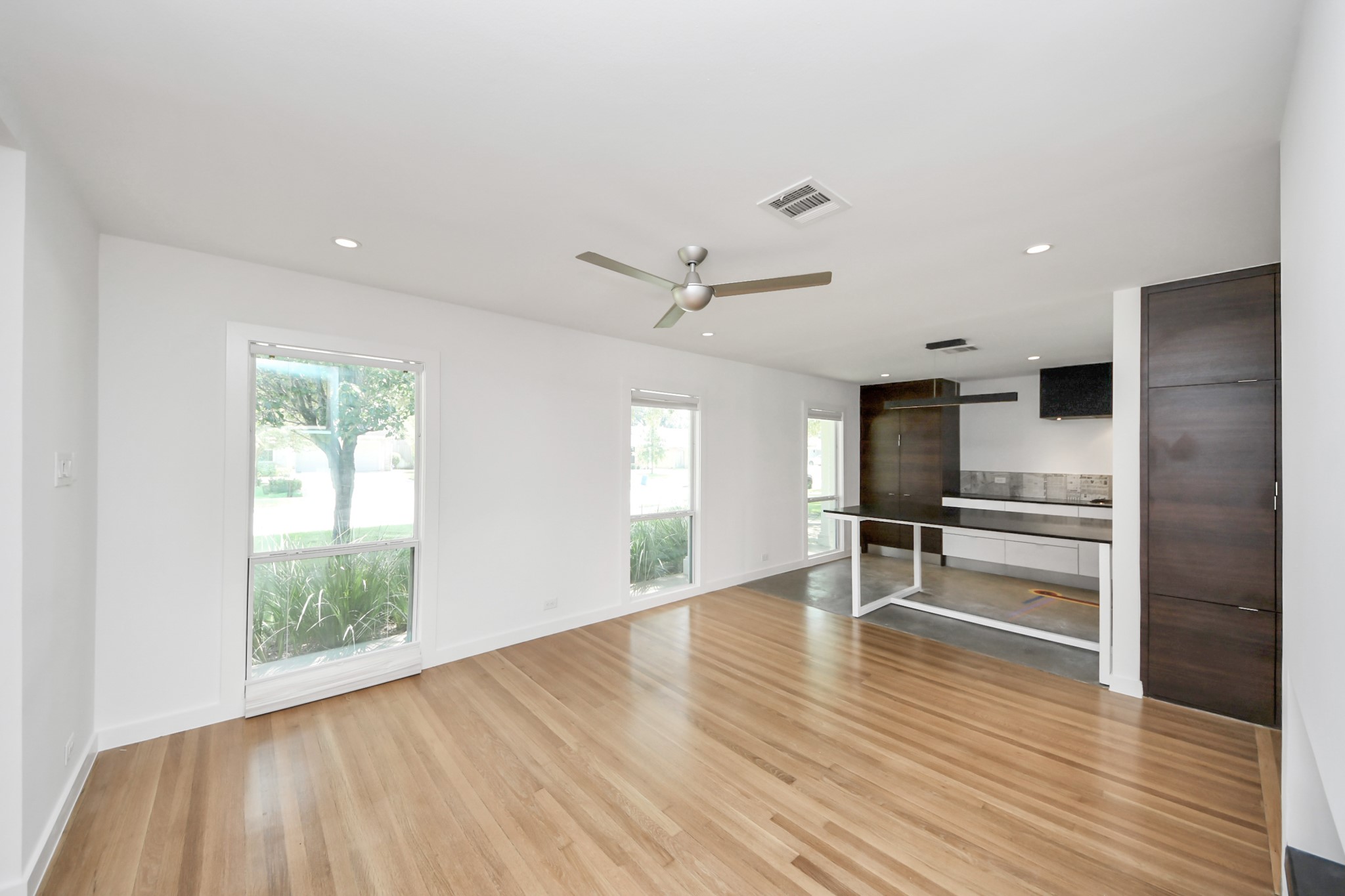 7610 Highmeadow Drive Houston, TX 77063 - Photo 14 of 50 a view of kitchen and sink in wooden floor