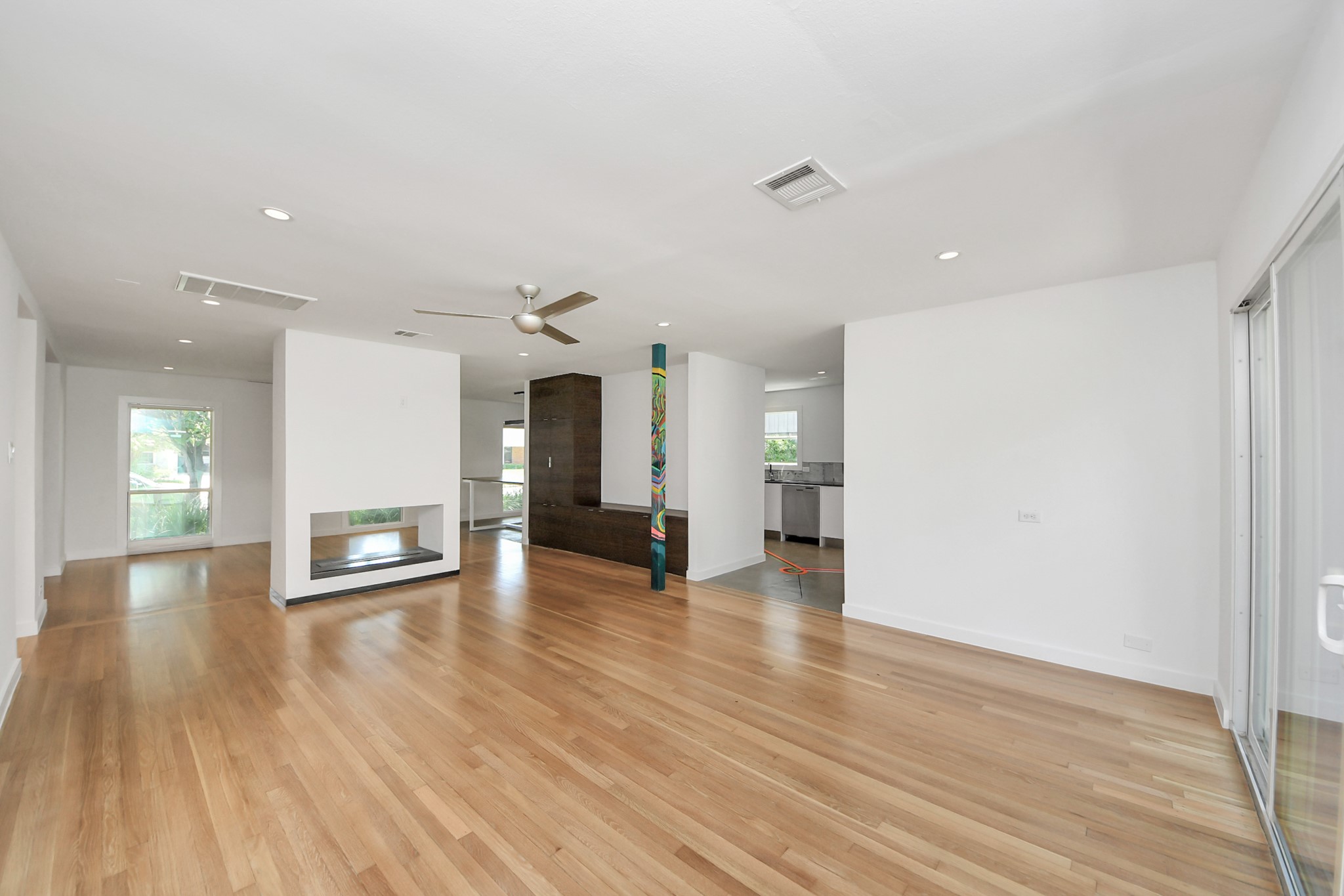 7610 Highmeadow Drive Houston, TX 77063 - Photo 19 of 50 a view of a livingroom with wooden floor