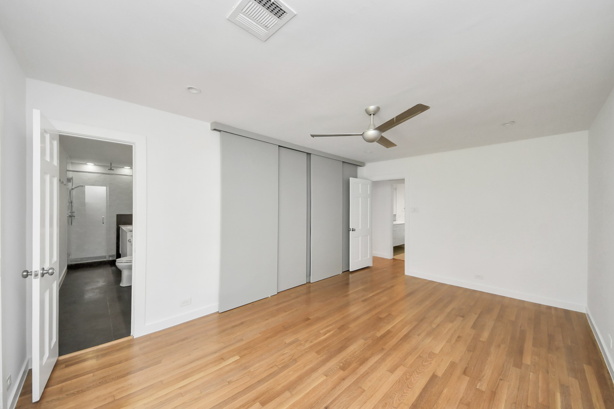 7610 Highmeadow Drive Houston, TX 77063 - Photo 42 of 50 a view of a big room with wooden floor and closet