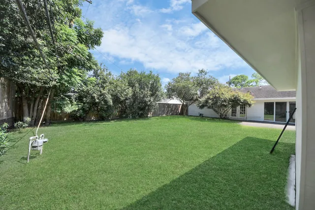 a view of a backyard with a garden