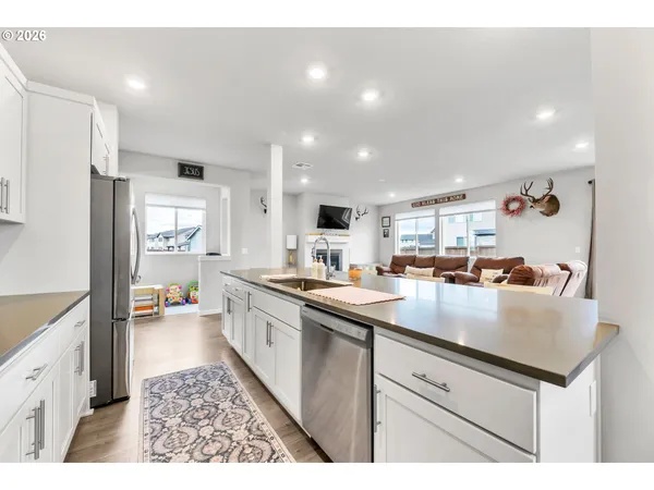 a livingroom with furniture and wooden floor