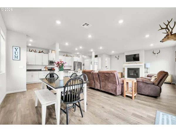 a bedroom with a bed and a table