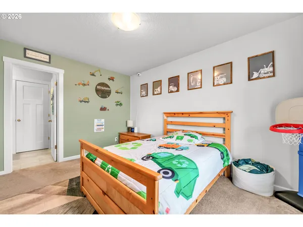 a bathroom with a sink mirror and vanity