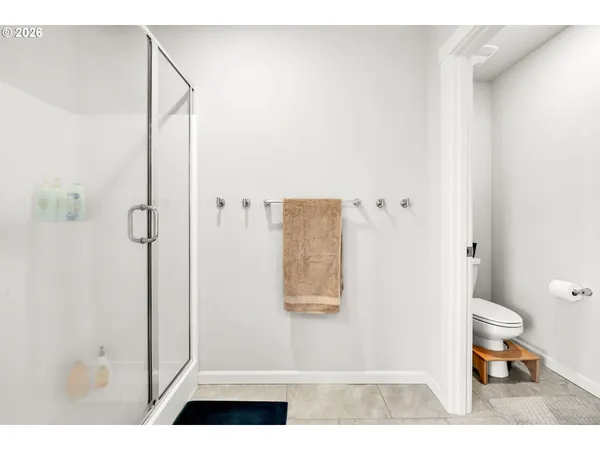 a view of a house with backyard and porch