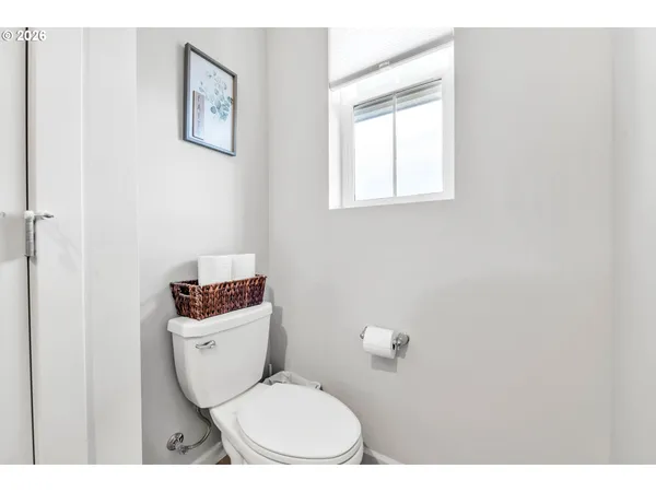 a bathroom with a toilet and a sink