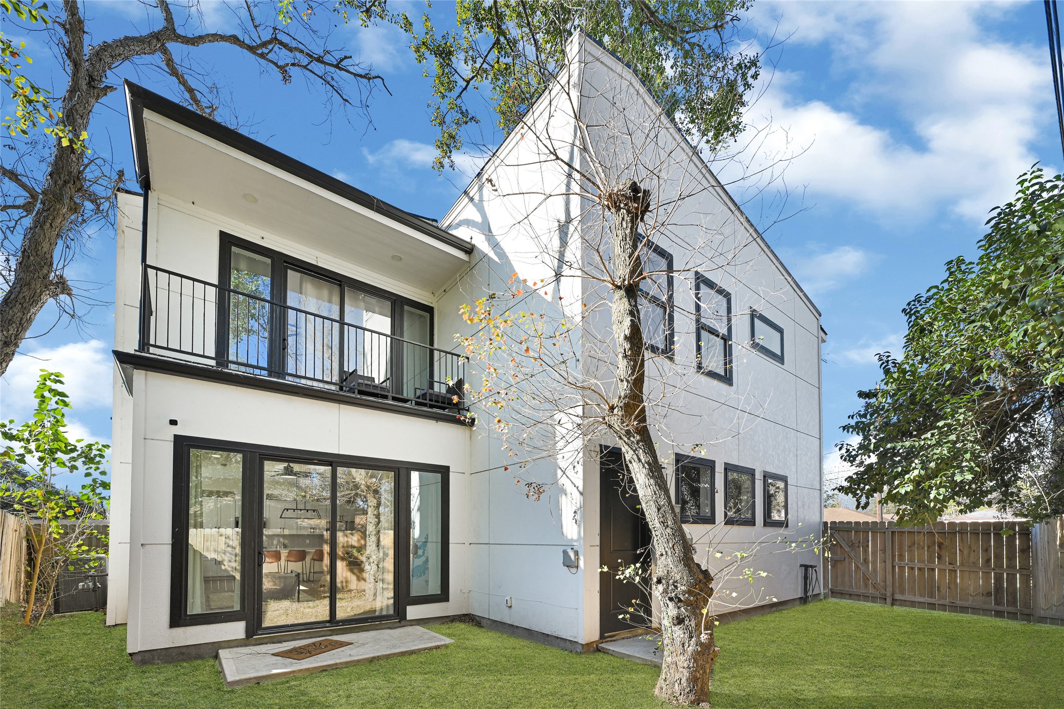 6835 Weston Street, Unit A Houston, TX 77021 - Photo 15 of 15 Backyard, Balcony and Sliding Door to Living Area