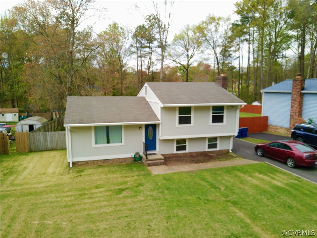 9525 Kennesaw Road Chesterfield, VA 23236 - Photo 6 of 28 a house view with a garden space
