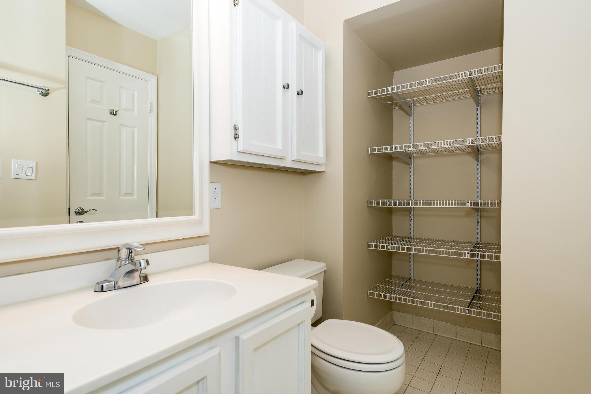 1830 17th Street Northwest, Unit 606 Washington, DC 20009 - Photo 13 of 26 Full bath, alt view, shows space for linens