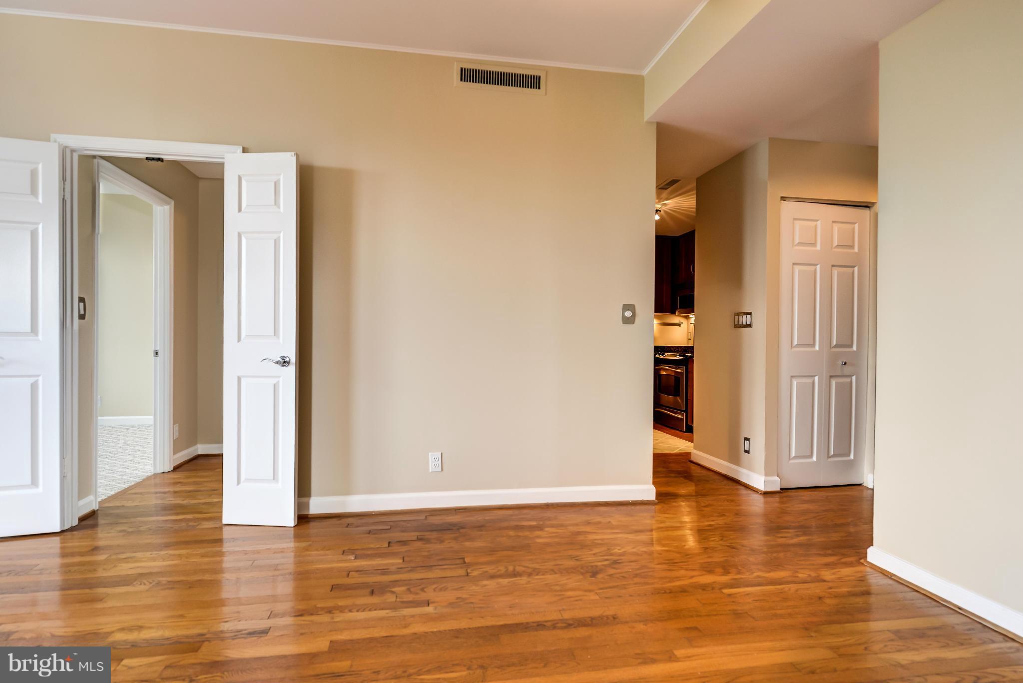 1830 17th Street Northwest, Unit 606 Washington, DC 20009 - Photo 4 of 26 Living room to dining room and kitchen