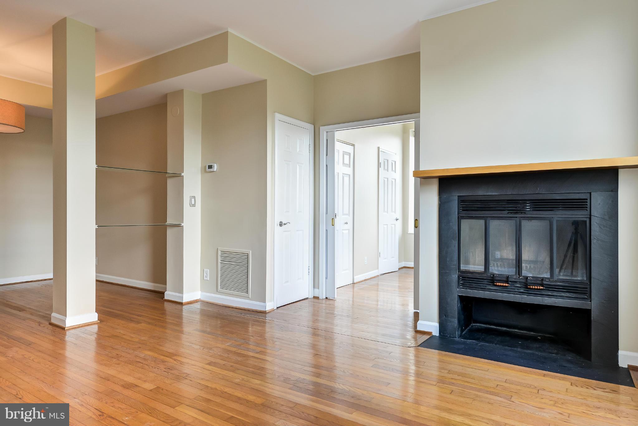 1830 17th Street Northwest, Unit 606 Washington, DC 20009 - Photo 7 of 26 Living room to second bedroom (pocket doors!)