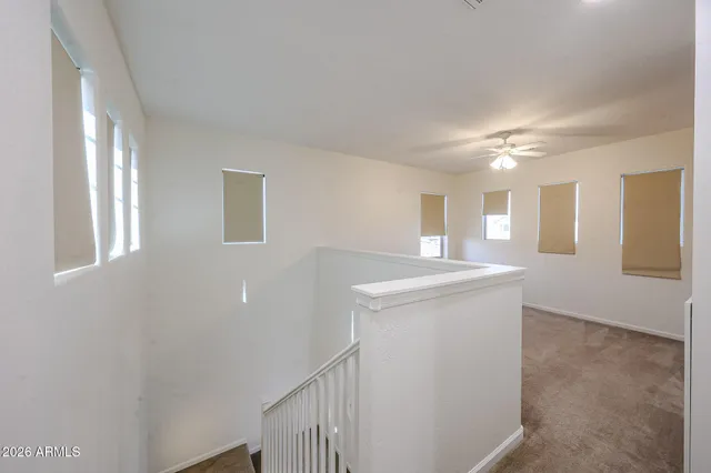 a bathroom with a sink a mirror and a shower