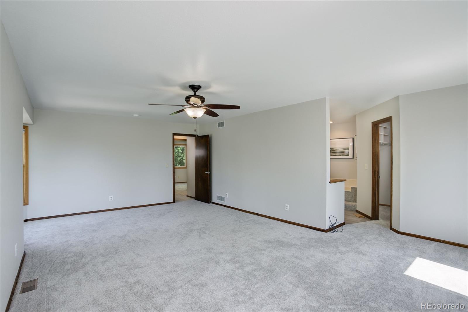 7877 West 110th Drive Westminster, CO 80021 - Photo 20 of 46 wooden floor in an empty room