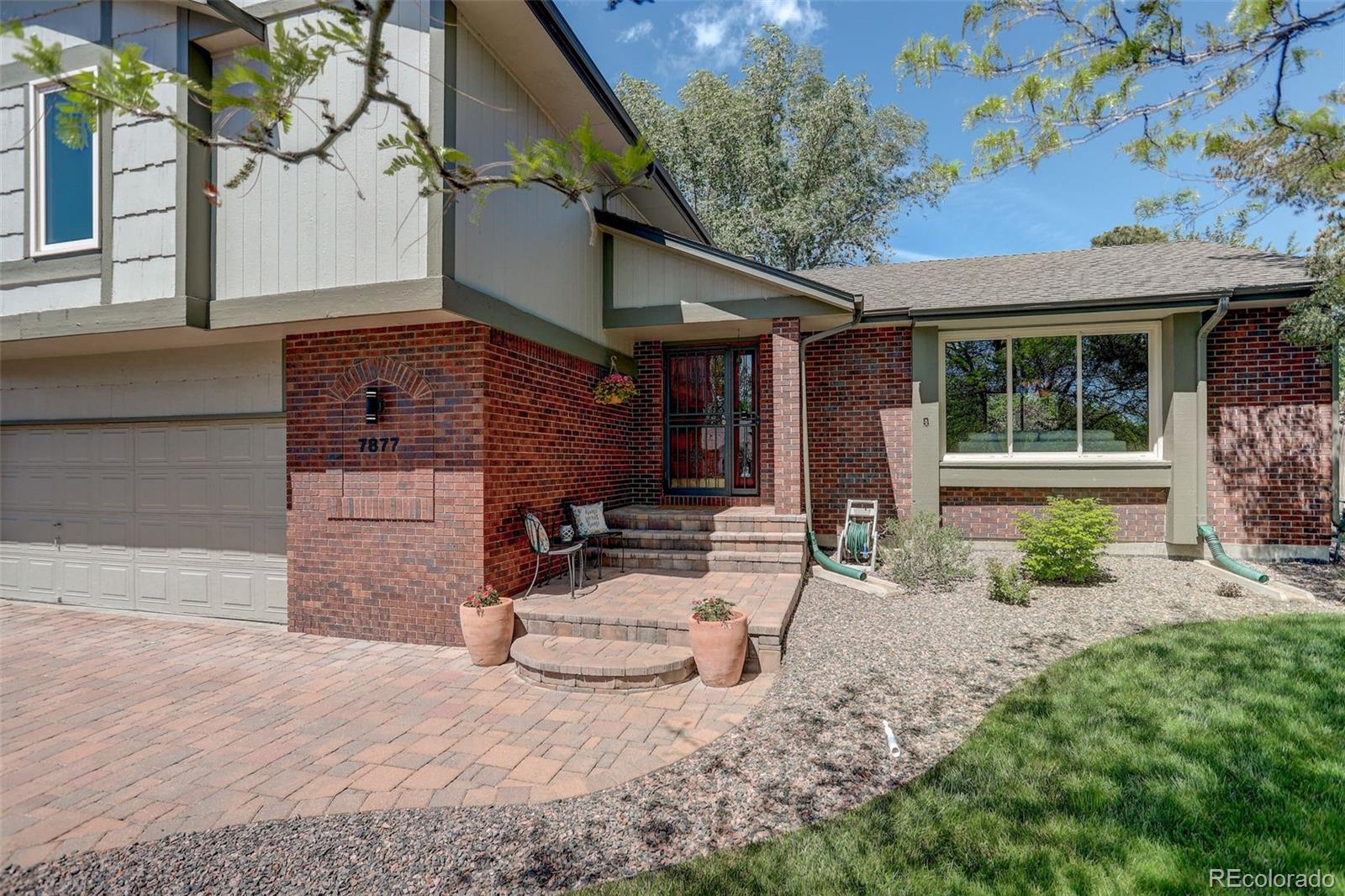 7877 West 110th Drive Westminster, CO 80021 - Photo 2 of 46 a view of a house with a patio