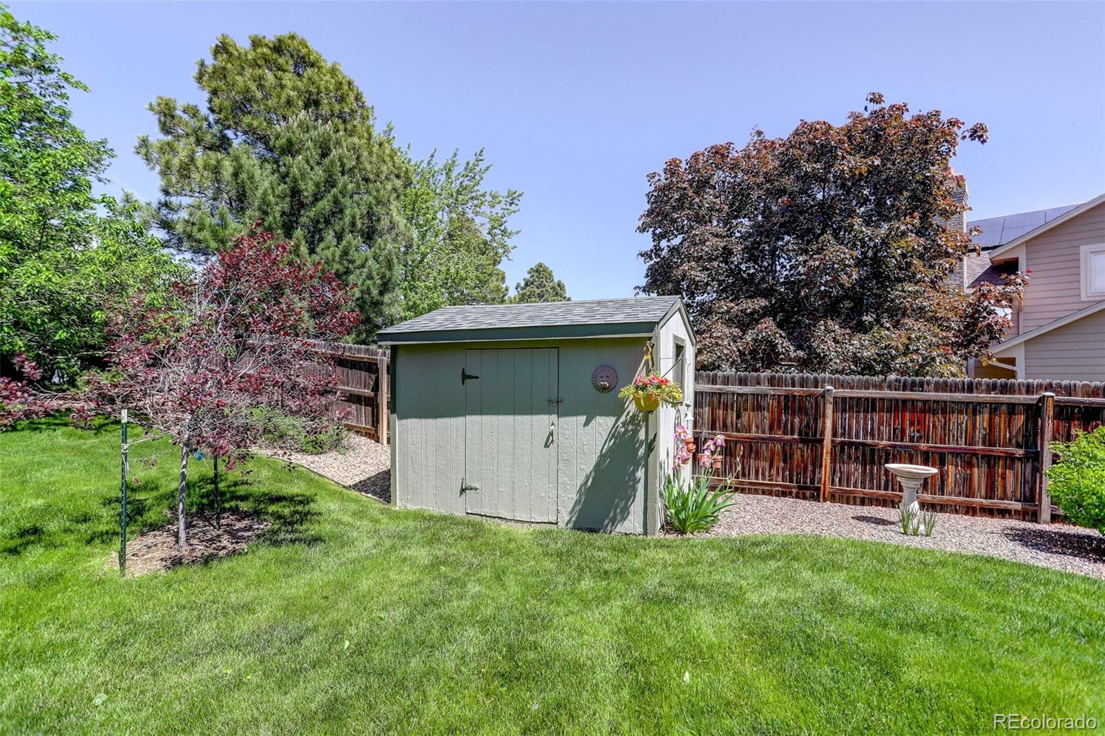 7877 West 110th Drive Westminster, CO 80021 - Photo 40 of 46 a view of backyard with green space