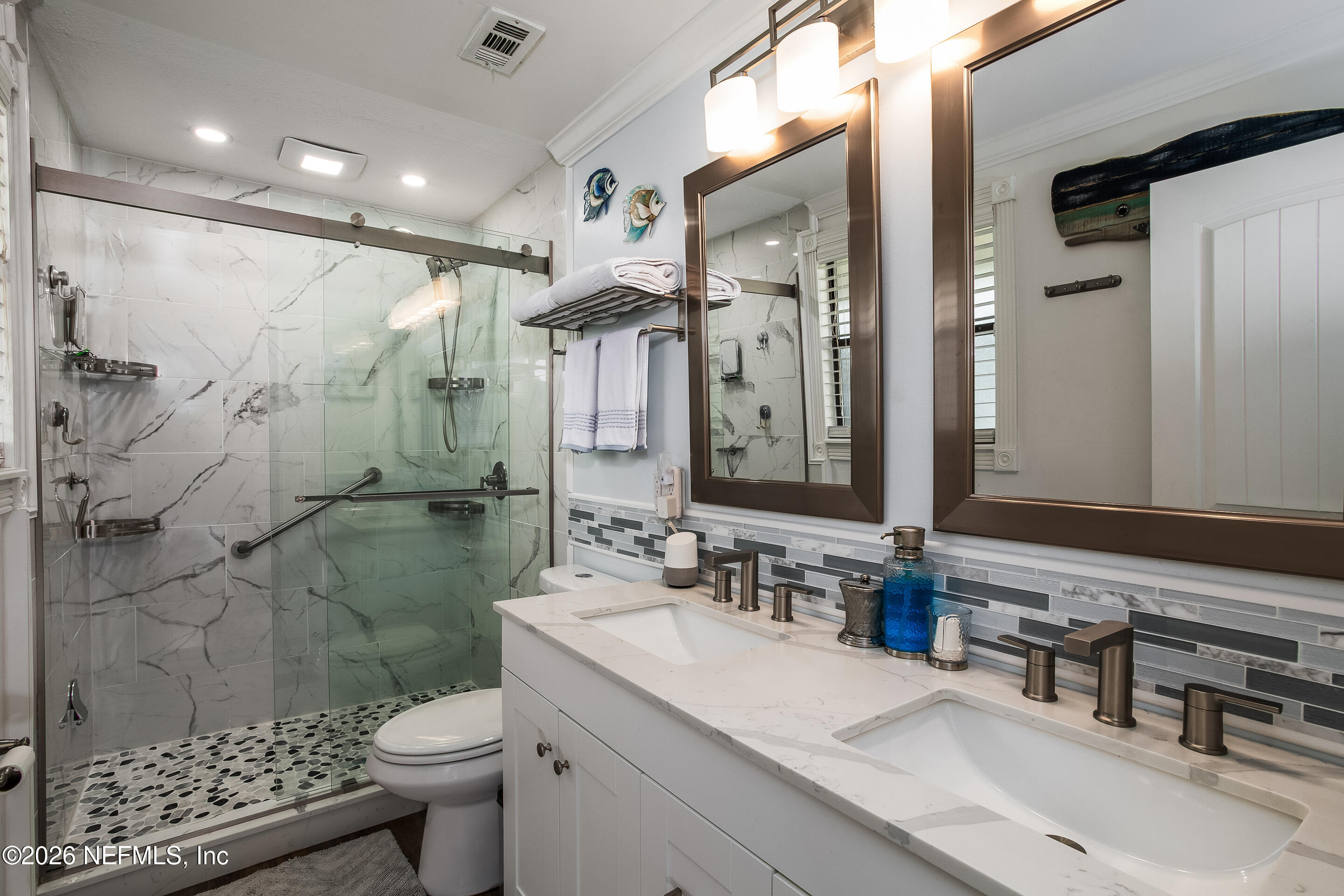 11401 Old Plank Road Jacksonville, FL 32220 - Photo 18 of 42 a bathroom with a sink toilet and shower