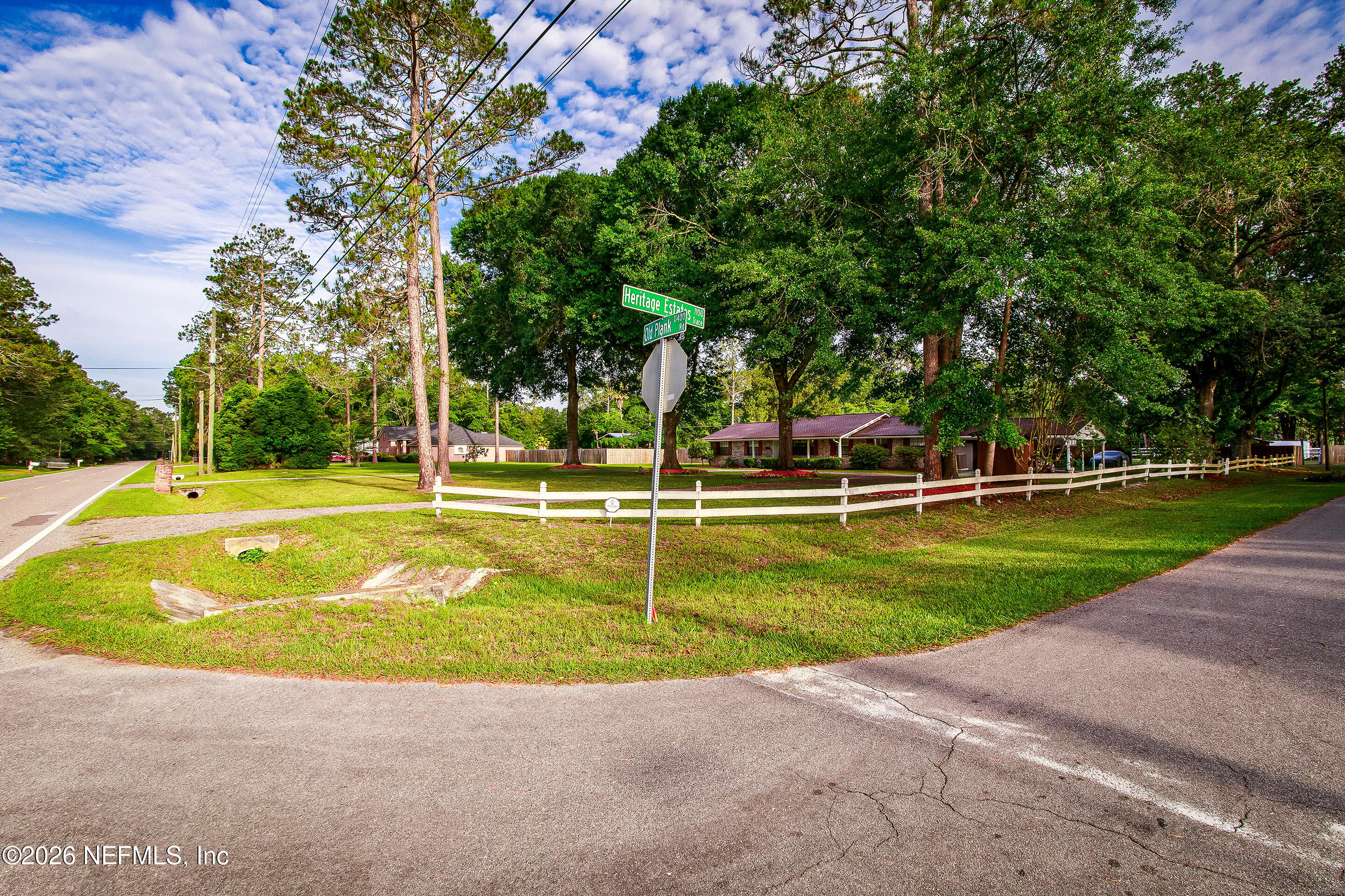 11401 Old Plank Road Jacksonville, FL 32220 - Photo 2 of 42 a view of a swimming pool with a yard