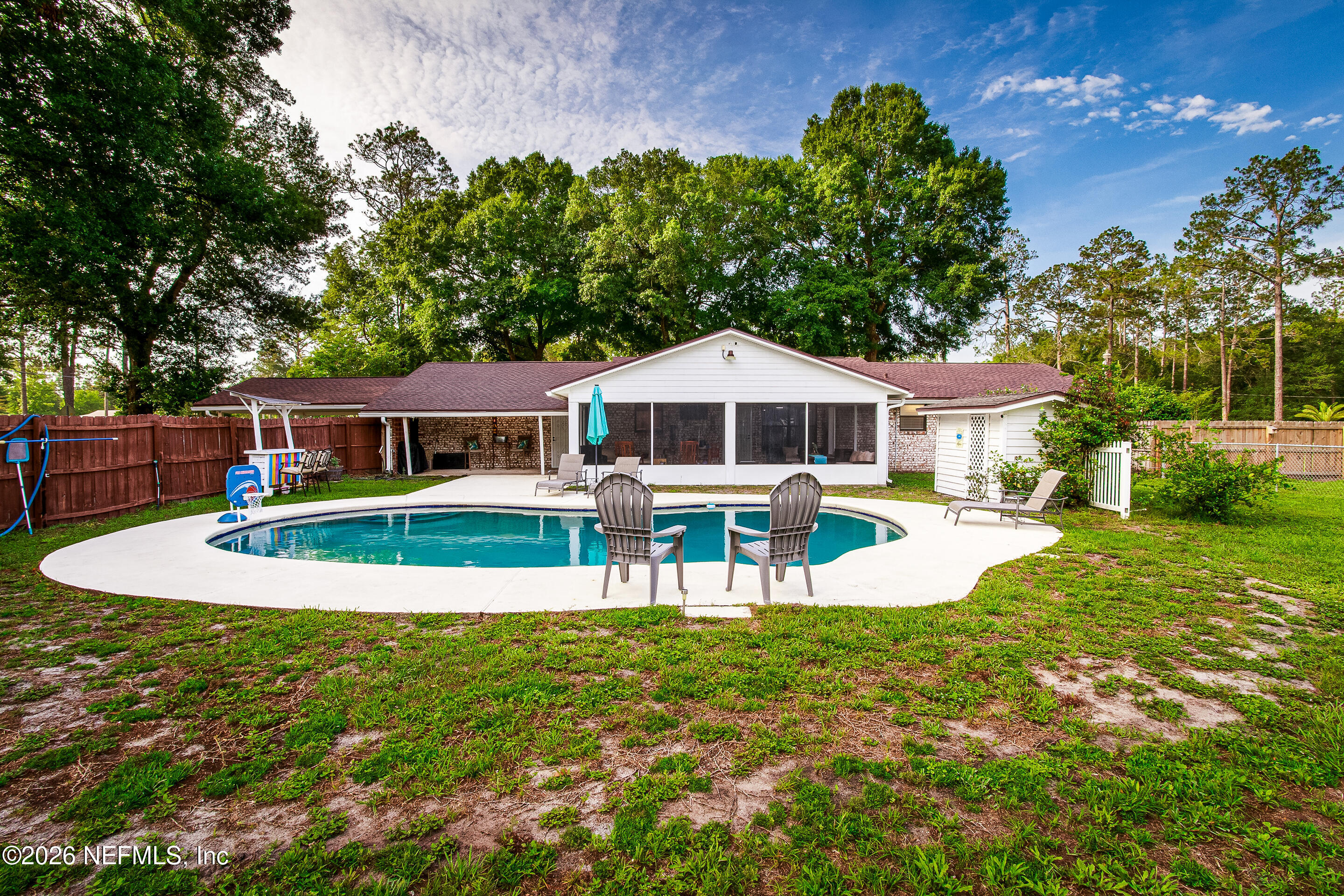 11401 Old Plank Road Jacksonville, FL 32220 - Photo 28 of 42 a view of a house with a yard patio and swimming pool