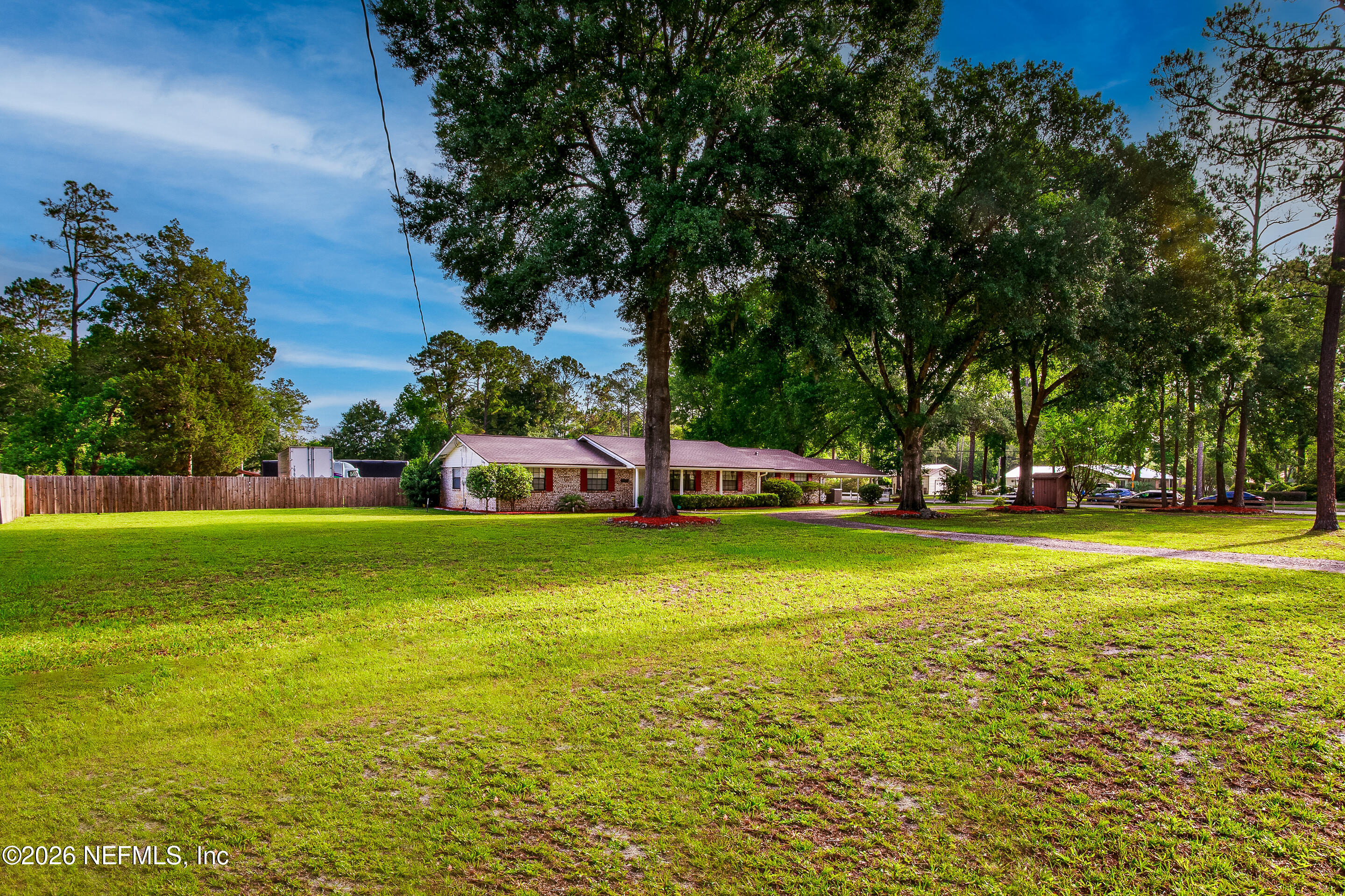 11401 Old Plank Road Jacksonville, FL 32220 - Photo 4 of 42 a view of yard with swimming pool and green space