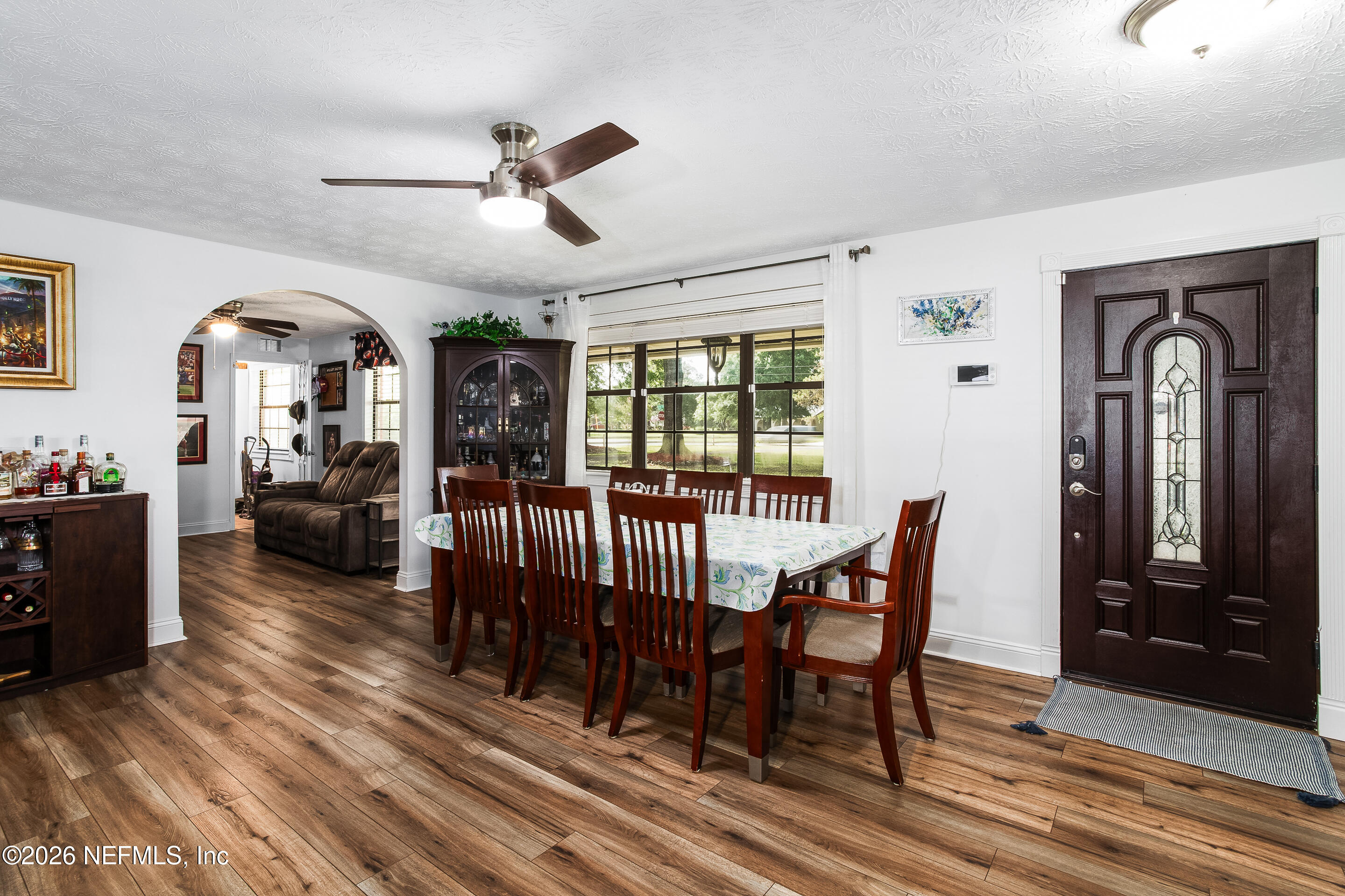 11401 Old Plank Road Jacksonville, FL 32220 - Photo 9 of 42 a view of a livingroom with furniture window and wooden floor