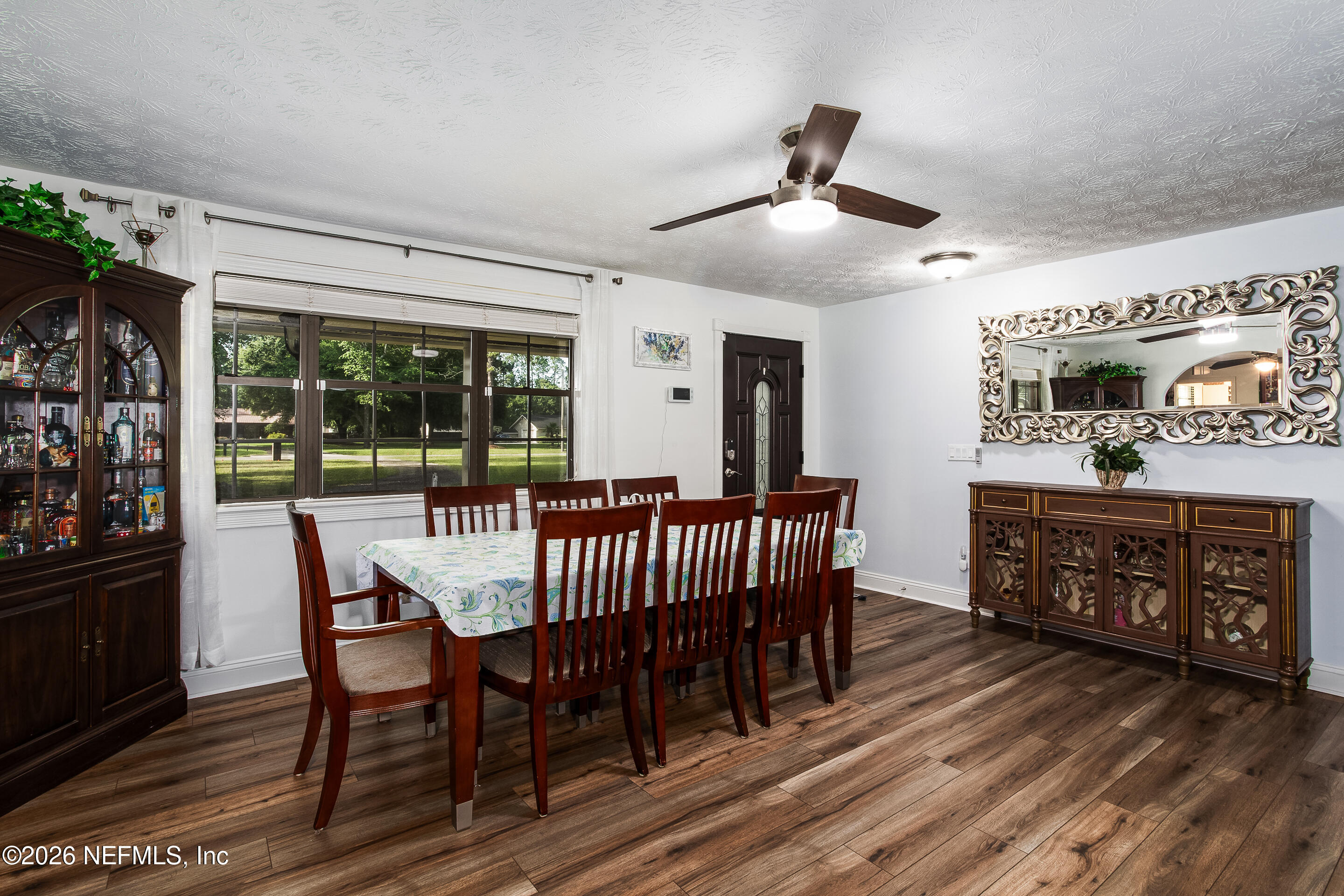 11401 Old Plank Road Jacksonville, FL 32220 - Photo 10 of 42 a view of a dining room with furniture window and outside view