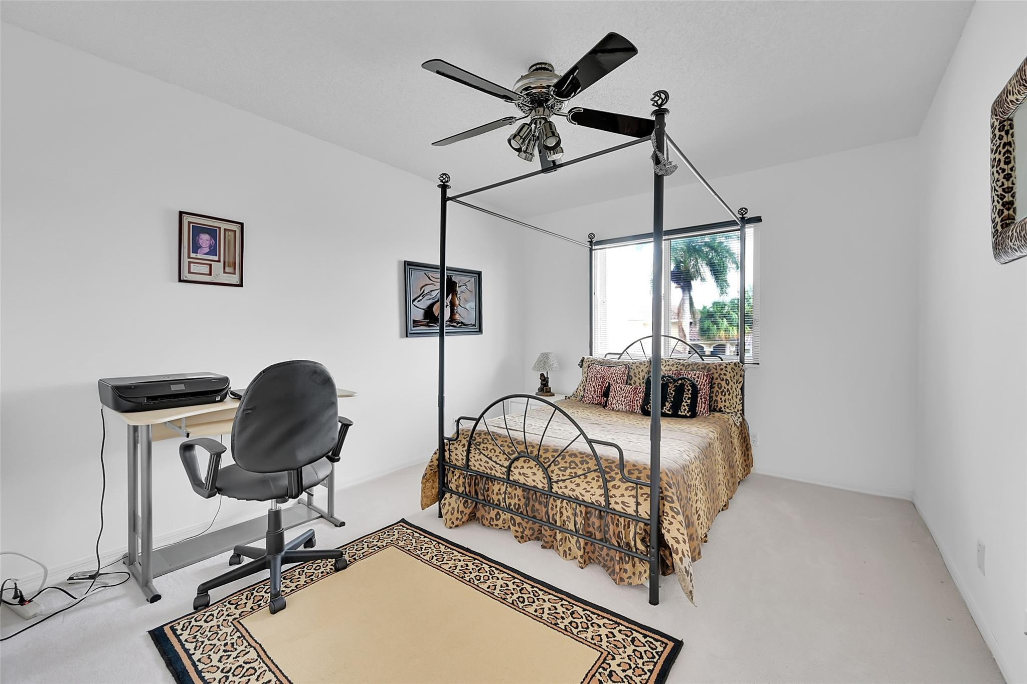 19640 Dinner Key Drive Boca Raton, FL 33498 - Photo 14 of 44 a bedroom with furniture and a window