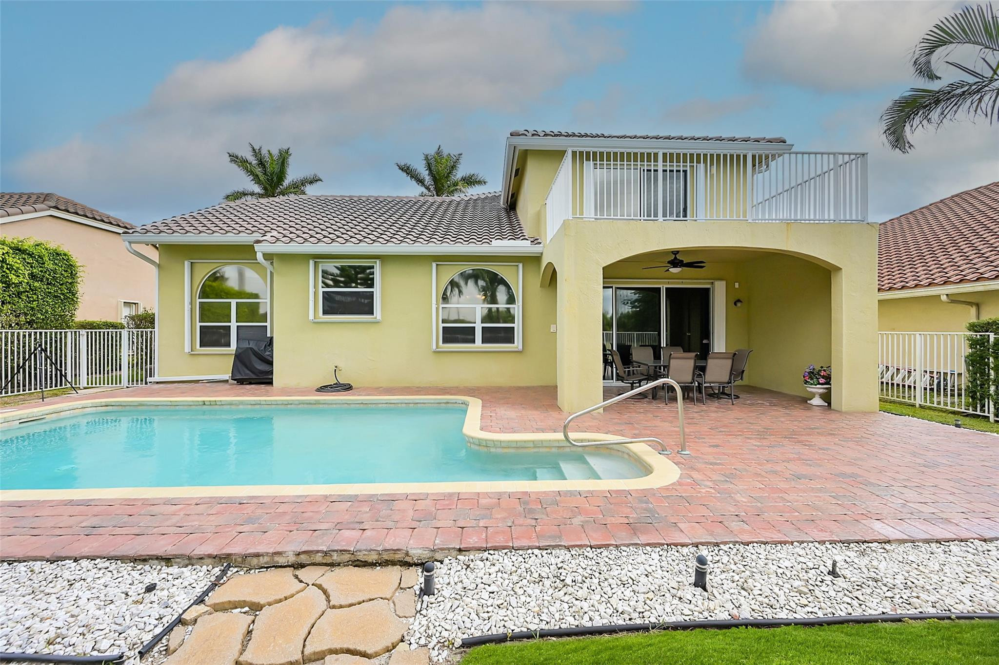 19640 Dinner Key Drive Boca Raton, FL 33498 - Photo 25 of 44 a front view of a house with garden