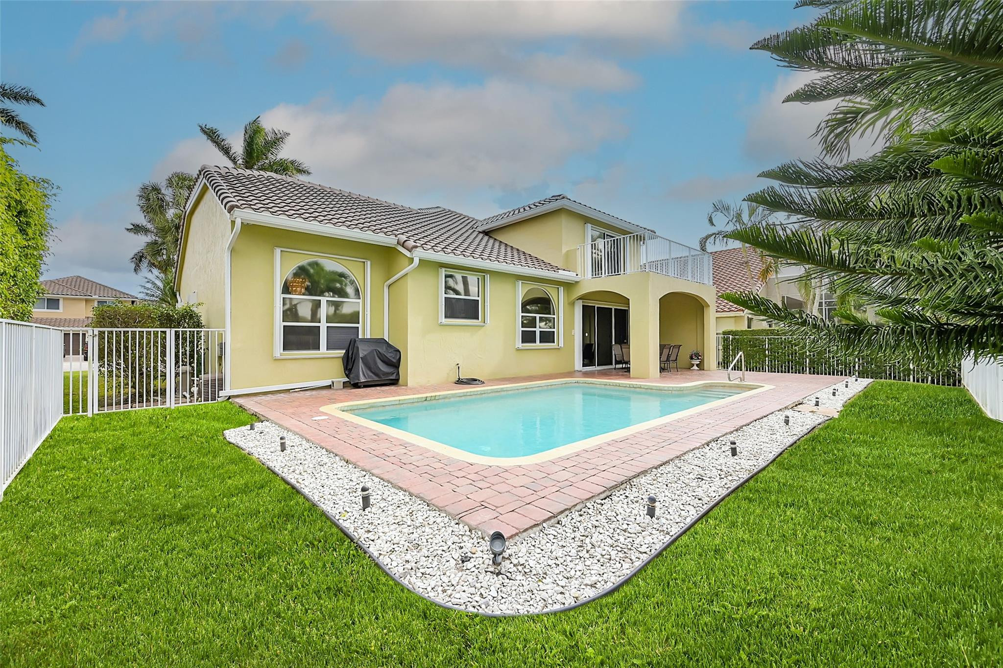 19640 Dinner Key Drive Boca Raton, FL 33498 - Photo 3 of 44 a front view of a house with a yard
