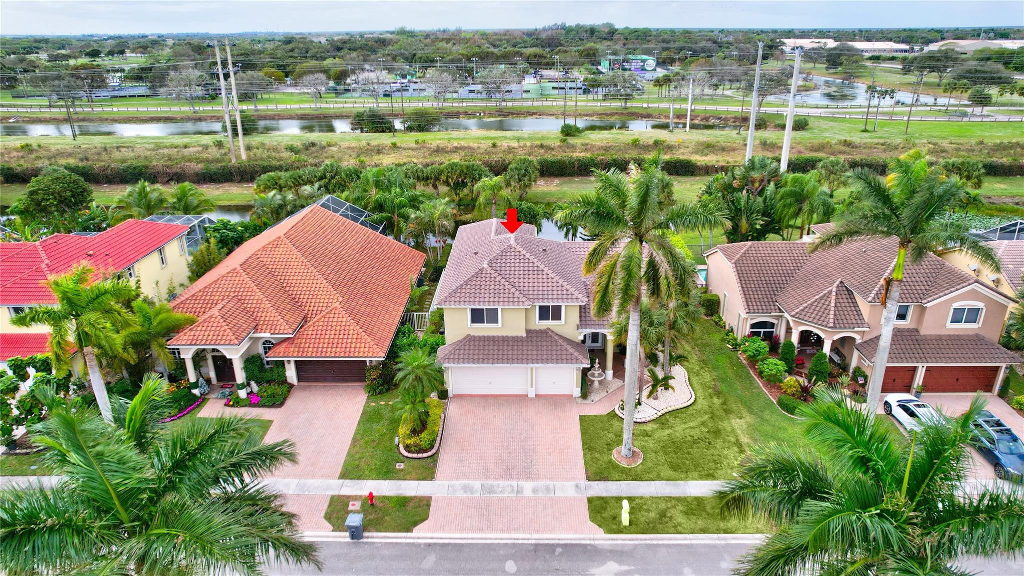 19640 Dinner Key Drive Boca Raton, FL 33498 - Photo 39 of 44 an aerial view of houses with yard