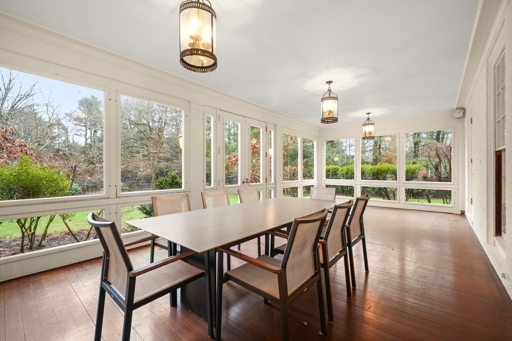 20 Sears Road Brookline, MA 02445 - Photo 9 of 40 a view of a dining room with furniture window and wooden floor