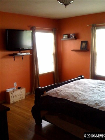 665 Arbutus Street Reno, NV 89509 - Photo 5 of 9 a bedroom with a bed and flat screen tv