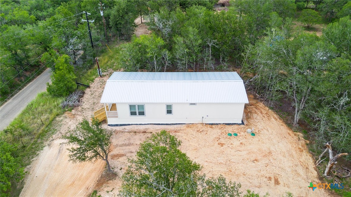 855 Roosevelt Road Luling, TX 78648 - Photo 38 of 47 front view of a house with a yard