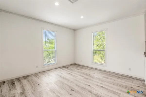 a kitchen with granite countertop a sink and a window