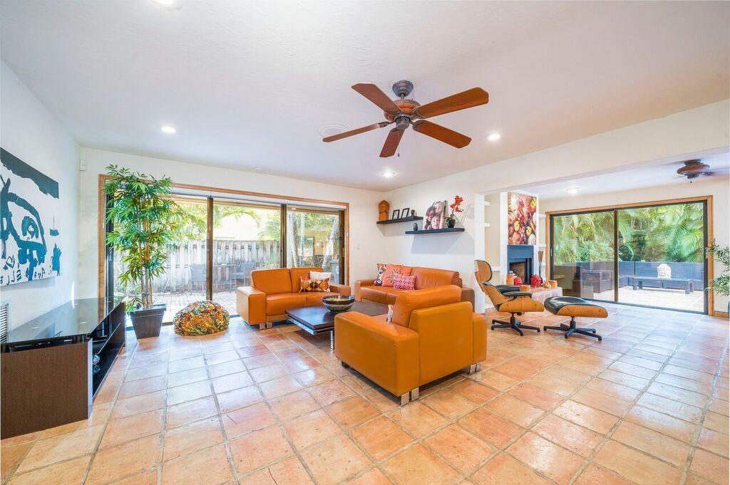 6761 Entrada Place Boca Raton, FL 33433 - Photo 25 of 69 a living room with furniture and a large window