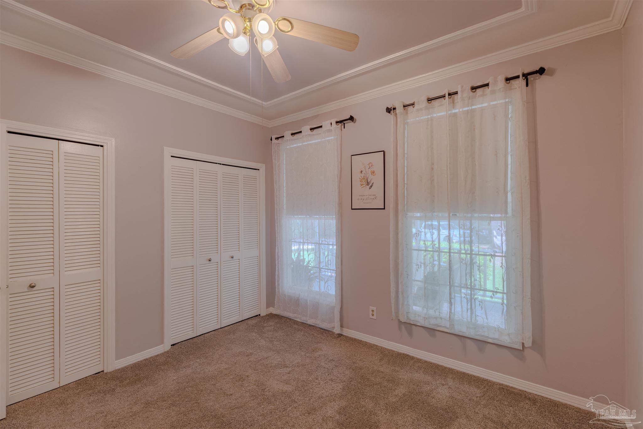 5049 Guernsey Road Pace, FL 32571 - Photo 34 of 61 a view of an empty room with a window