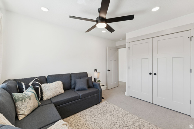 51 East 200 North, Unit 3 Bountiful, UT 84010 - Photo 16 of 27 Living room featuring light carpet, ceiling fan, and recessed lighting