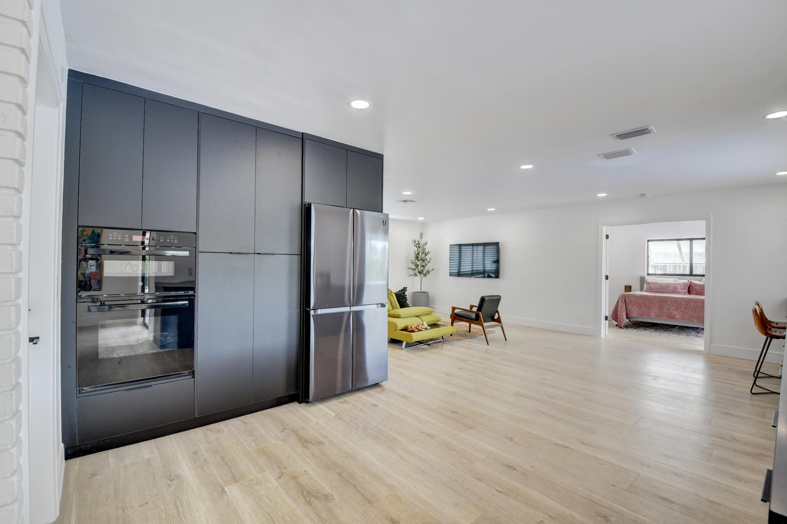 1270 Southwest 13th Drive Boca Raton, FL 33486 - Photo 13 of 23 a kitchen with a refrigerator and a sink