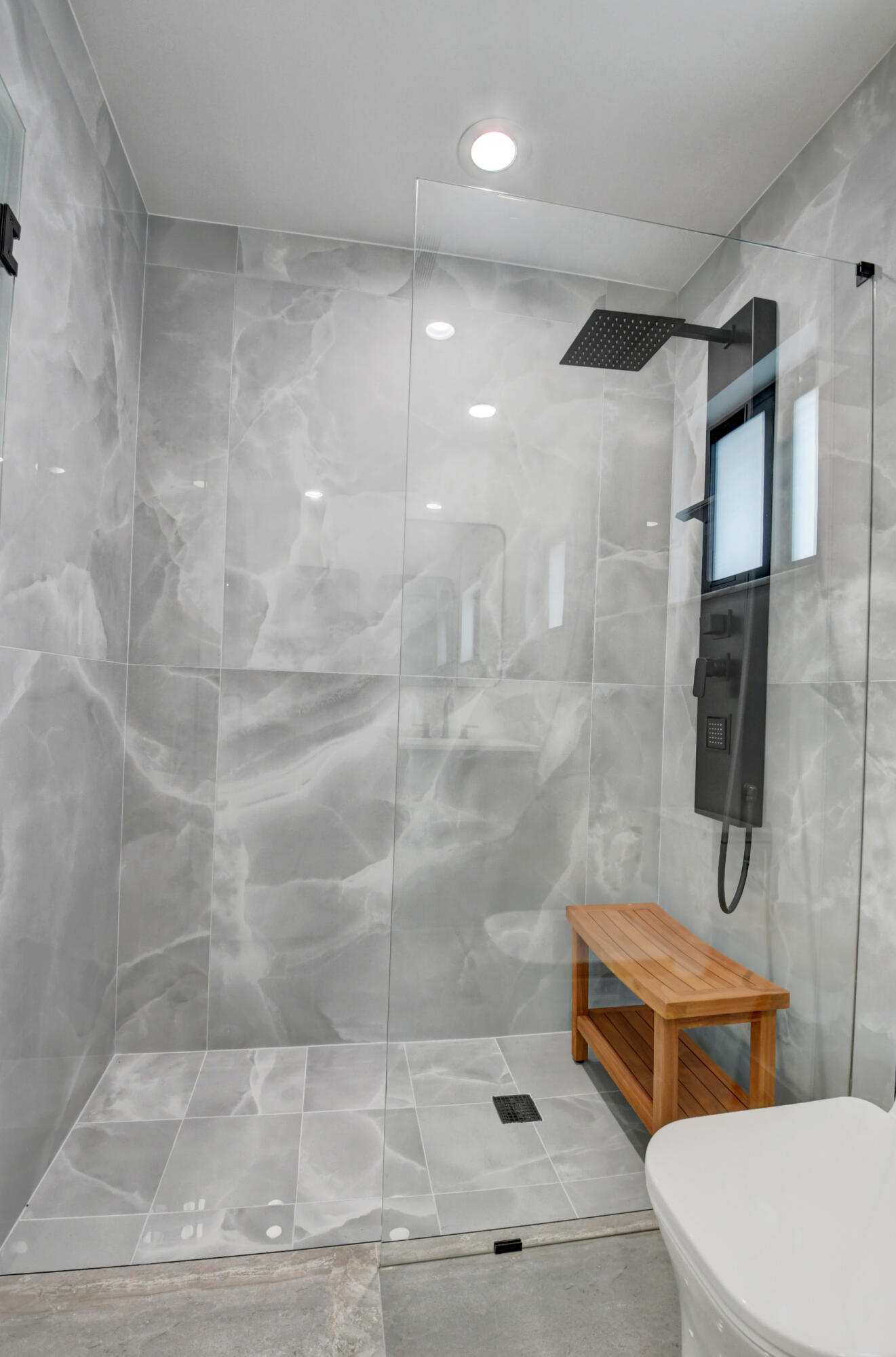 1270 Southwest 13th Drive Boca Raton, FL 33486 - Photo 9 of 23 a bathroom with a shower and a toilet