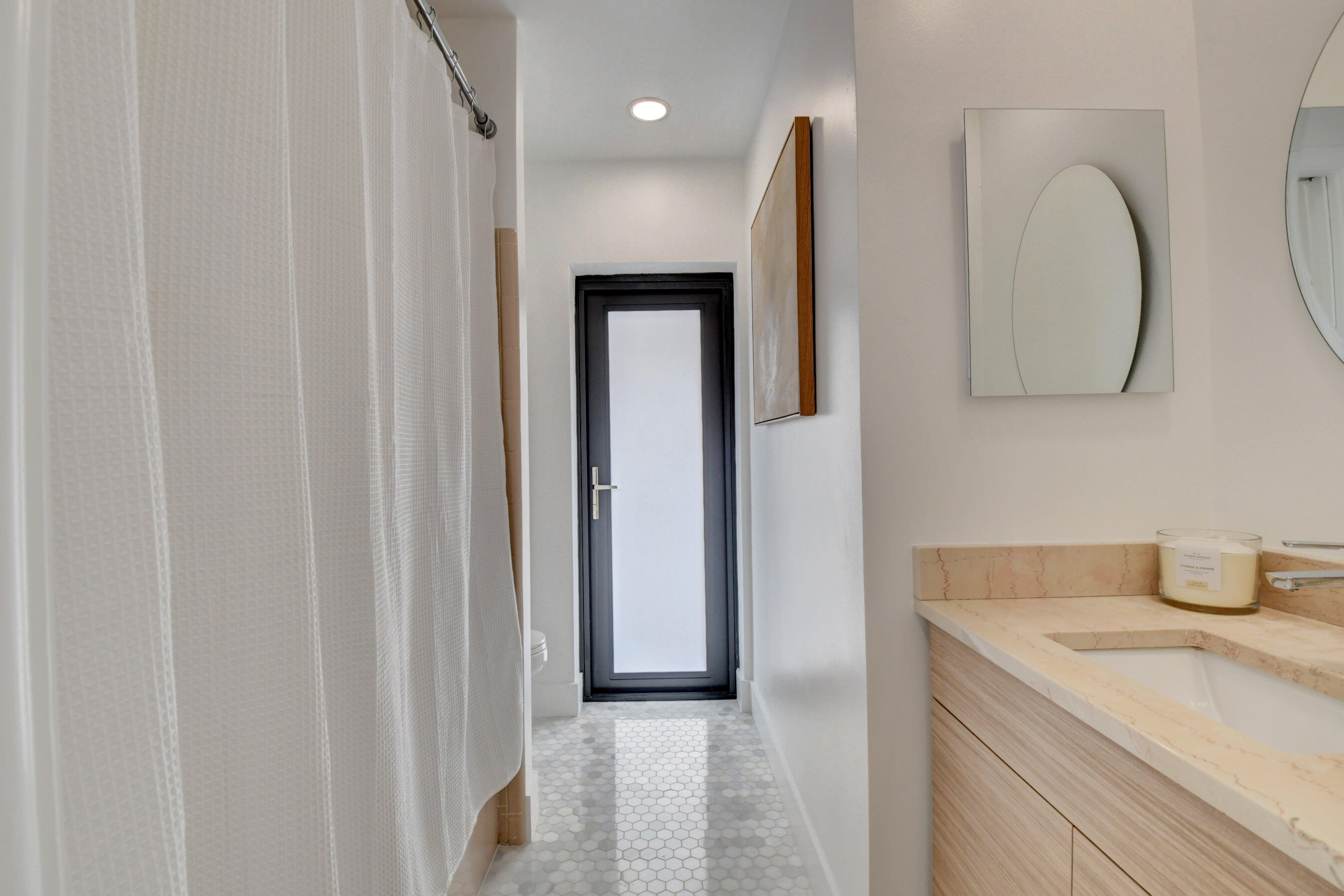 1270 Southwest 13th Drive Boca Raton, FL 33486 - Photo 10 of 23 a bathroom with a sink and a mirror