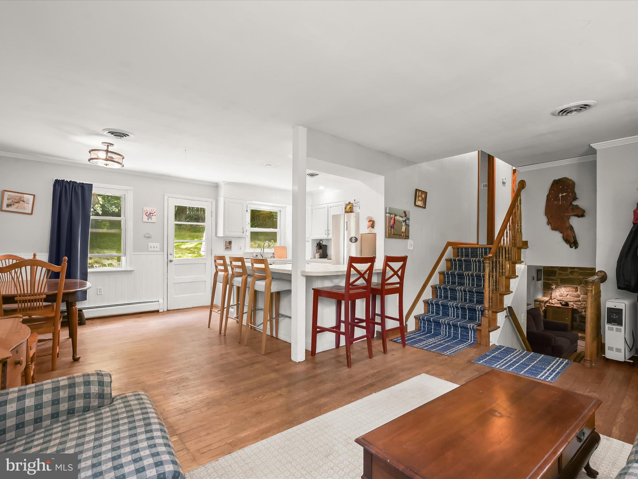 17515 Masemore Road Parkton, MD 21120 - Photo 36 of 36 a living room with furniture a wooden floor and next to a window