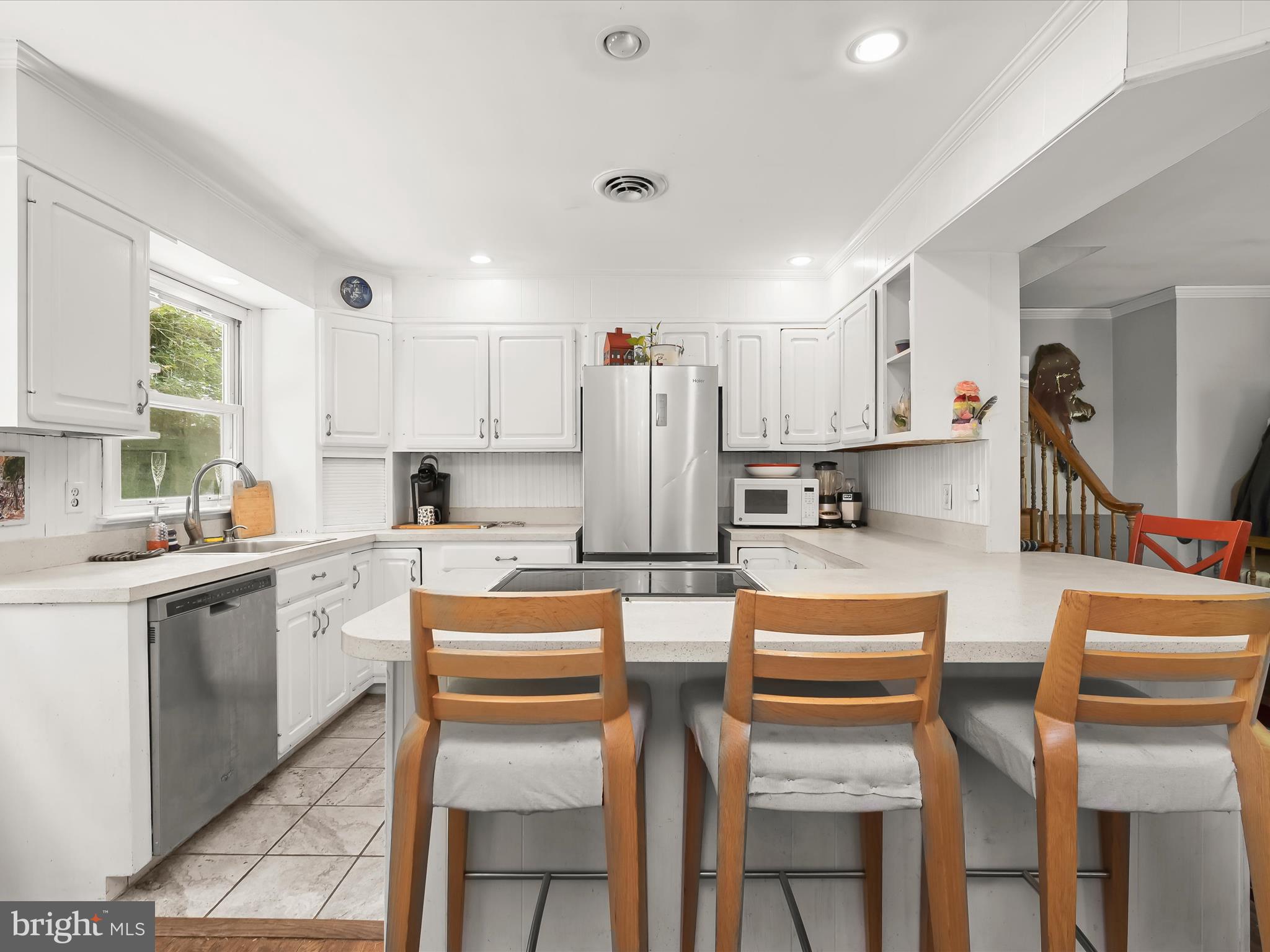 17515 Masemore Road Parkton, MD 21120 - Photo 14 of 36 a kitchen with appliances a sink and cabinets