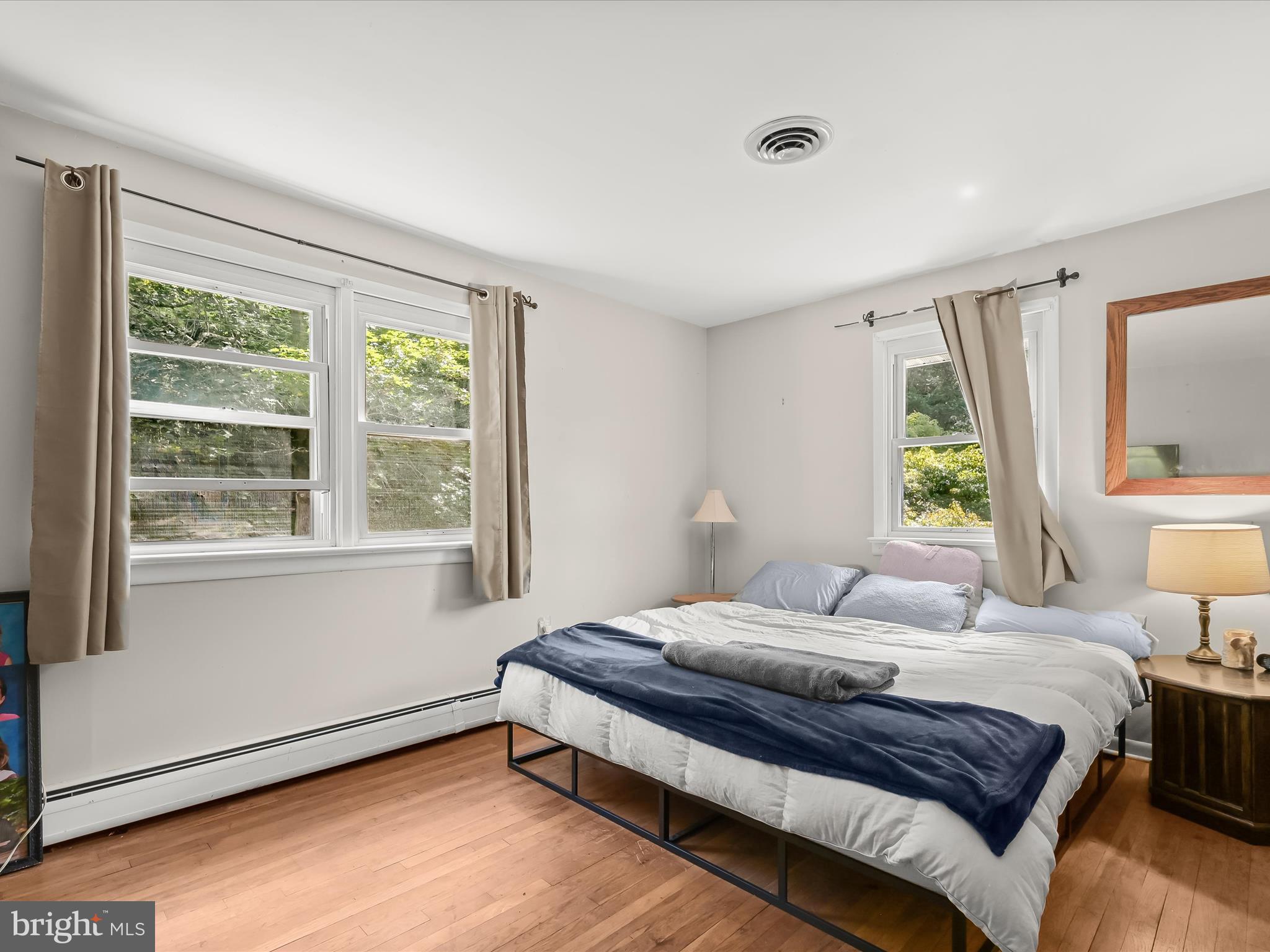 17515 Masemore Road Parkton, MD 21120 - Photo 16 of 36 a bedroom with a bed and a window