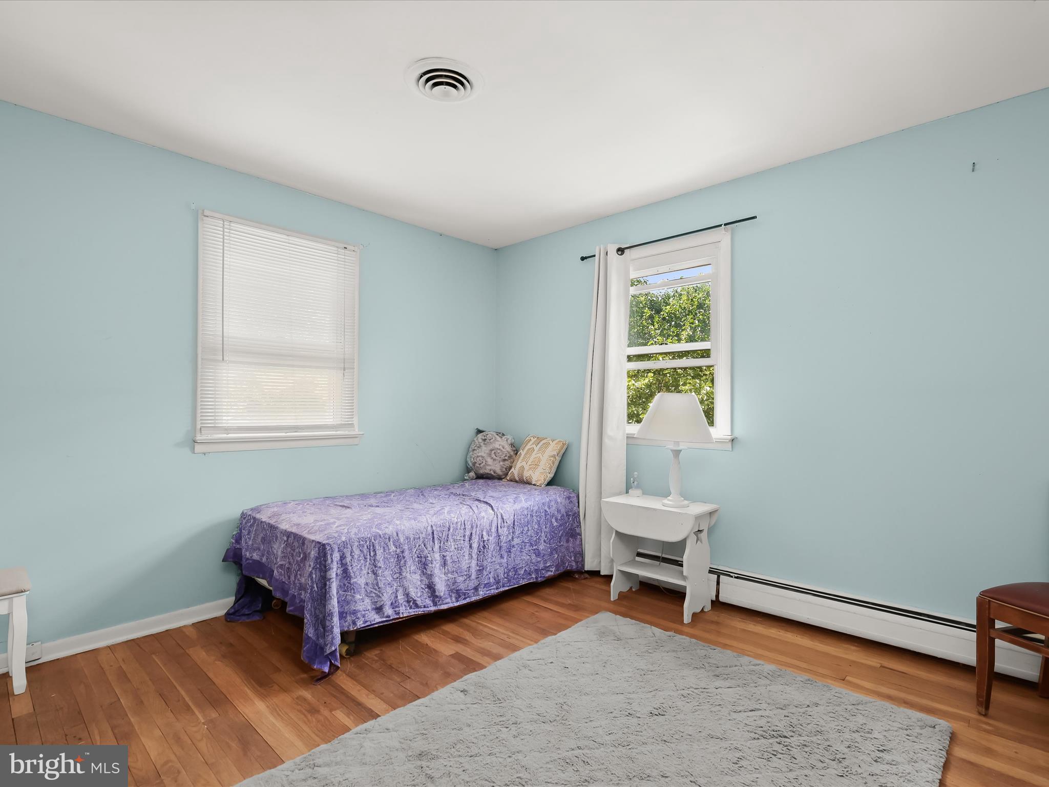 17515 Masemore Road Parkton, MD 21120 - Photo 19 of 36 a bedroom with a bed and a window