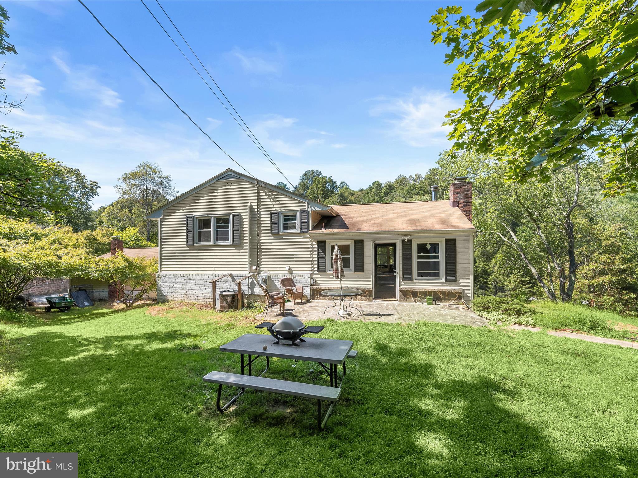 17515 Masemore Road Parkton, MD 21120 - Photo 24 of 36 a front view of a house with garden